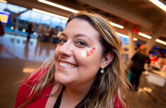 A smiling volunteer at a Light The Night event.